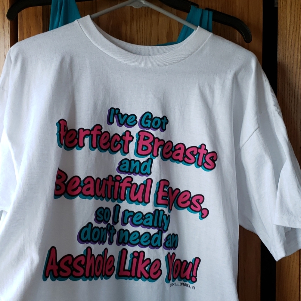 Funny white t shirt. Never wore XL